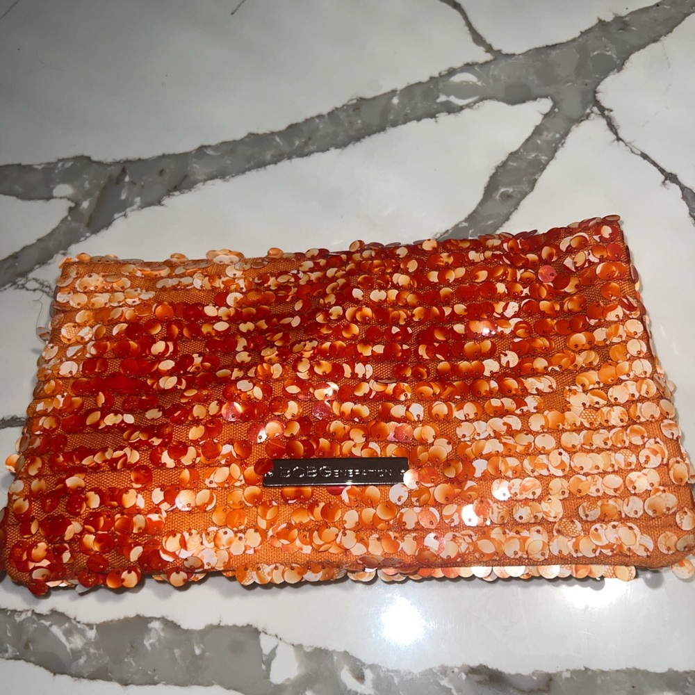 BCBG extendable clutch purse